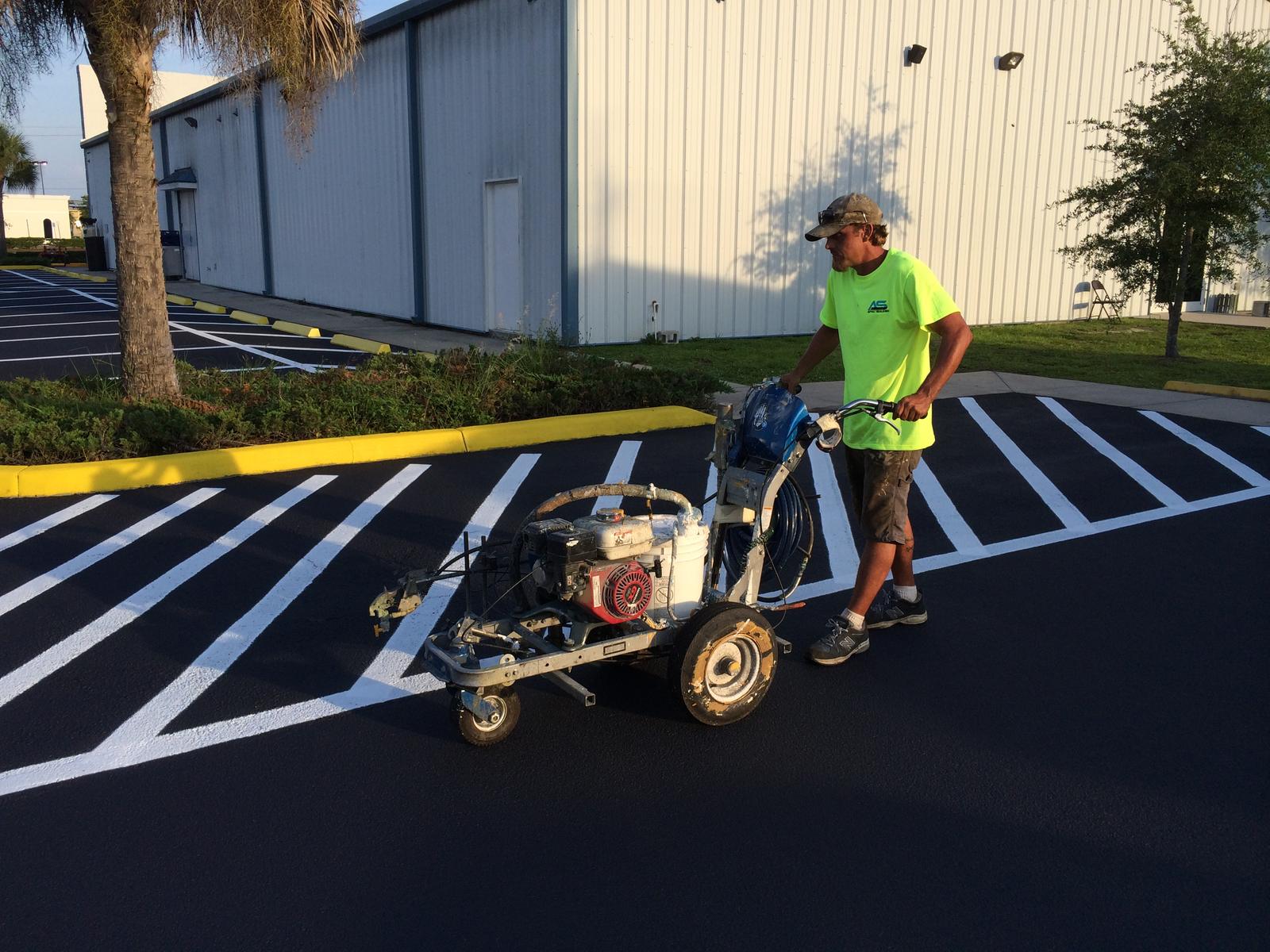 Crosshatched loading zone and yellow curbs